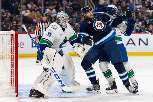 Winnipeg Jets captain Adam Lowry back on skates