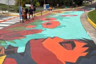 A new mural in the fight against gun violence — painted where blood once spilled