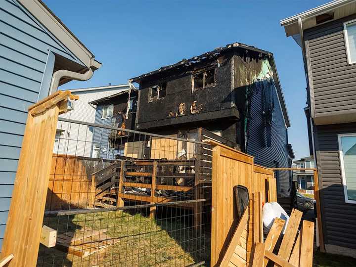 Duplex fire in northeast Calgary displaces five, sends toddler to hospital