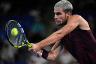 Swiatek wins 400th career match at China Open. Alcaraz reaches Japan final