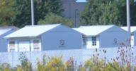 Dairy Drive encampment to close; huts set for auction
