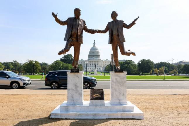 Mysterious statue of Trump and Epstein holding hands appears in Washington DC