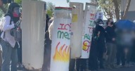 Two arrested in connection with public demonstration charged with terrorism