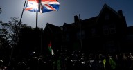 Police make six arrests as protestors demonstrate outside Manchester hotel