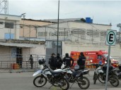 14 killed as rival Ecuadoran inmates riot with guns, explosives