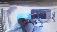 Moment armed cops burst into 'Brazilian Fritzl's' twisted compound 'where stepdad kept daughter as sex slave for 22yrs'