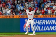 Edmundo Sosa returns from IL with 3 homers as Phillies clinch first