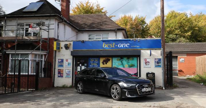 Police descend on shop after worker 'hit on head with baton' during robbery