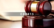 Woman sues former Britt police officer, city, over domestic abuse