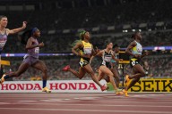 Despite a stumble, Sha'Carri makes the 100-meter final at world championships