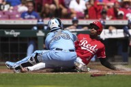 Marte hits walk-off single after Reds lose tying run on lodged ball, Cincinnati tops Blue Jays 5