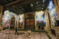 A massive mural honoring NYC immigrants now fills the entrance to St. Patrick’s Cathedral