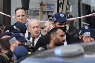Palestinian attackers open fire at Jerusalem bus stop, killing six