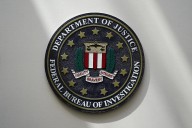 Two arrested in Utah after bomb found under news media vehicle