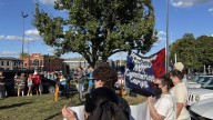 Protestors gather outside U.S. Rep. Jefferson Shreve's office, opposing Camp Atterbury ICE detainments