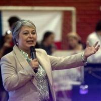 Chilean candidate downplays communist roots in quest for presidency