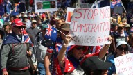Mass protests wrap up in Sydney and Melbourne without significant incident, at least two arrests made