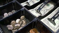 Federal Reserve cuts key rate by quarter-point and signals two more cuts this year