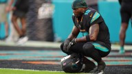 Dolphins WR Tyreek Hill carted off with knee injury vs. Jets