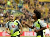 Dortmund keep heat on Bayern with Mainz win