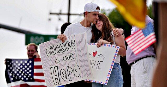 Photos: Americans Memorialize Charlie Kirk Outside TPUSA Headquarters