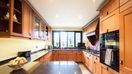 How To Affordably Upgrade An Outdated 2000s Kitchen To Boost The Home's Value
