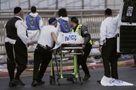 Palestinian gunmen open fire at Jerusalem bus stop, kill 6