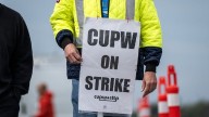 Canada Post denies Ottawa's reforms give it leverage over striking union in negotiations