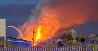 'Massive' Glasgow east end blaze as residents report 'explosions' and 'strong smell'