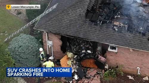 Fire erupts after SUV crashes into Lehigh Valley home
