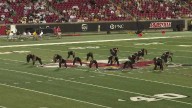 Sacred Heart, Assumption dance teams perform during halftime of St. X vs. Trinity game
