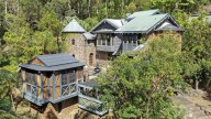 A one-of-a-kind fairytale castle on Tamborine Mountain has hit the market