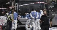 Palestinian gunmen kill 6 people in attack on Jerusalem bus stop