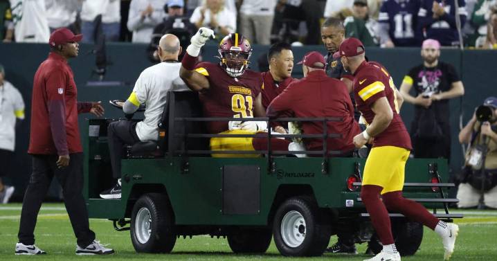 Commanders defensive end Deatrich Wise Jr. carted off the field with right leg injury vs. Packers