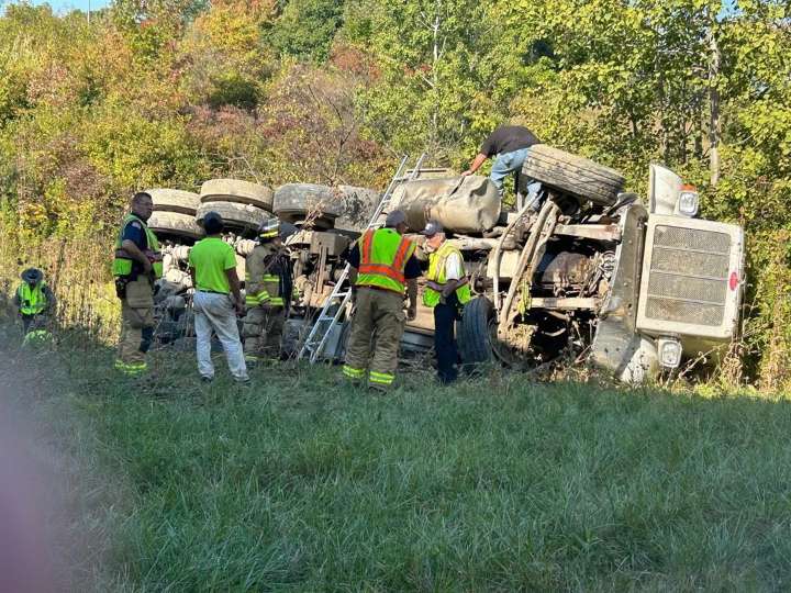 Fuel tank leaks after truck rolls over on I