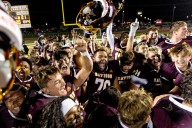 PHOTOS: Davison battles Warren De La Salle in tough high