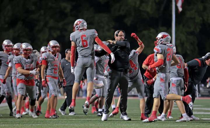Mentor football runs over Brunswick, 45