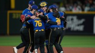 Mariners beat Rockies for 17th win in 18 games, secure first