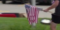 Volunteers line streets of Willard, Mo., with American flags ahead of 9/11