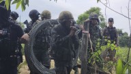 Thai security forces use rubber bullets and tear gas in border melee with Cambodian protesters