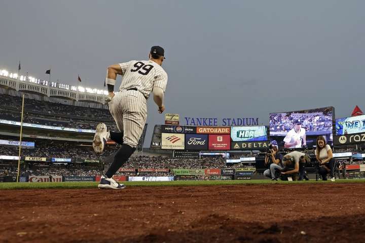 Judge throws gingerly in first outfield appearance since July, but insists arm is 100 per cent