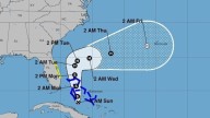 Soon-to-be Imelda expected to remain farther offshore, forecasters say