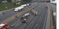 Overturned car blocking left lanes on I-285 eastbound near Buford Highway
