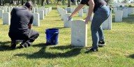 Quad Cities volunteers honor patriots on Arsenal cemetery: ‘My dad would do this for me’
