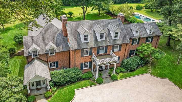 Muttontown estate for sale has main house, cottage, lots of privacy