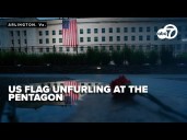 U.S. flag unfurled at Pentagon in solemn tribute on 9/11 anniversary