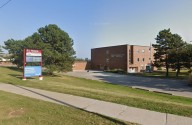 Oshawa dad drives through high school field after child in fight: Cops
