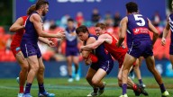 Justin Longmuir is weary of Gold Coast’s clearance threat as he urges Fremantle Dockers to get dirty