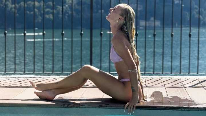 Bikini-clad Alisha Lehmann shows off incredible football skills by the pool as she soaks up sun in Lake Como