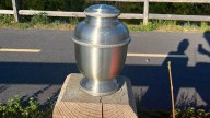 Urn with cremated remains found on running trail in Canton